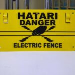 electric fence warning sign